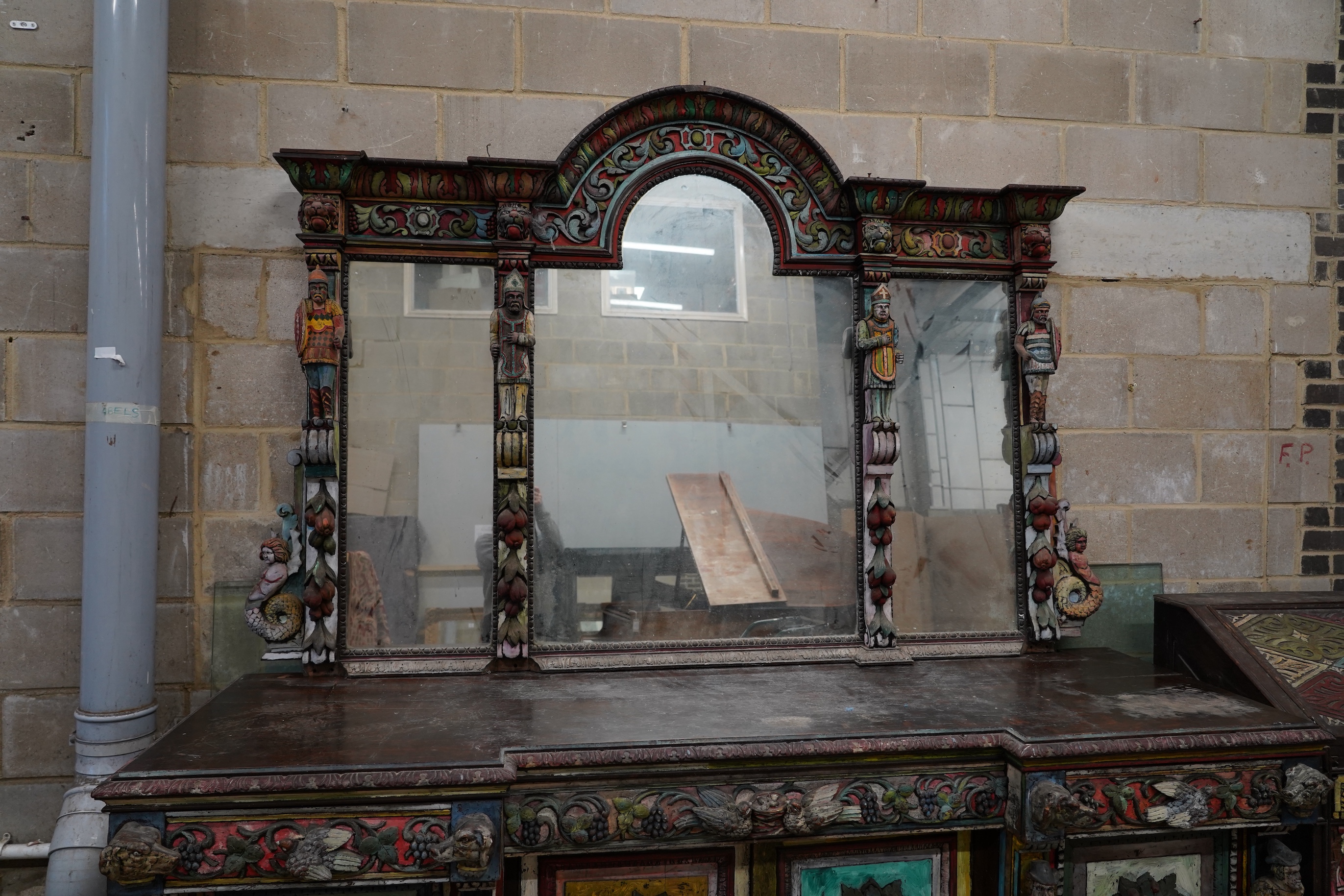 John Bratby (1928-1992): A monumental mirror backed buffet sideboard, polychrome decorated by the artist